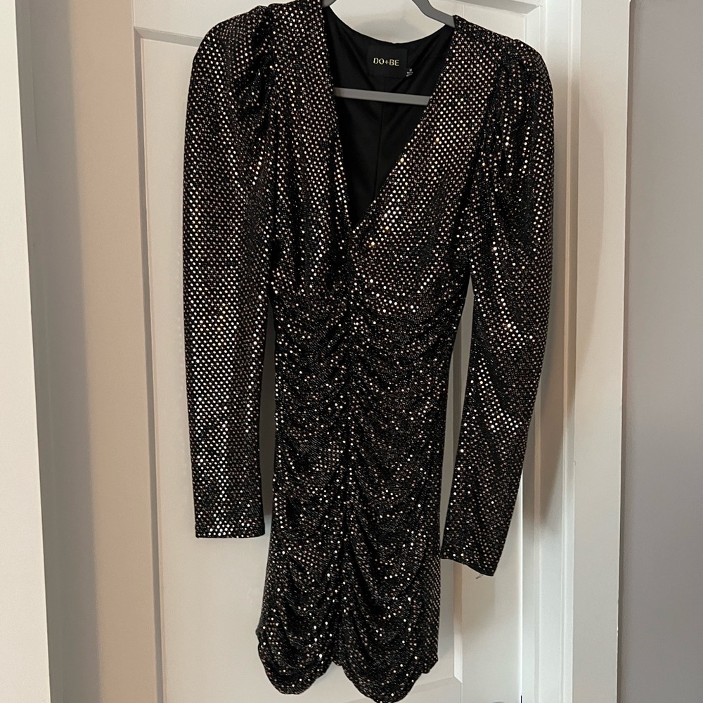 Sparkly DOBE long sleeve semi formal dress with puffy shoulder detail
